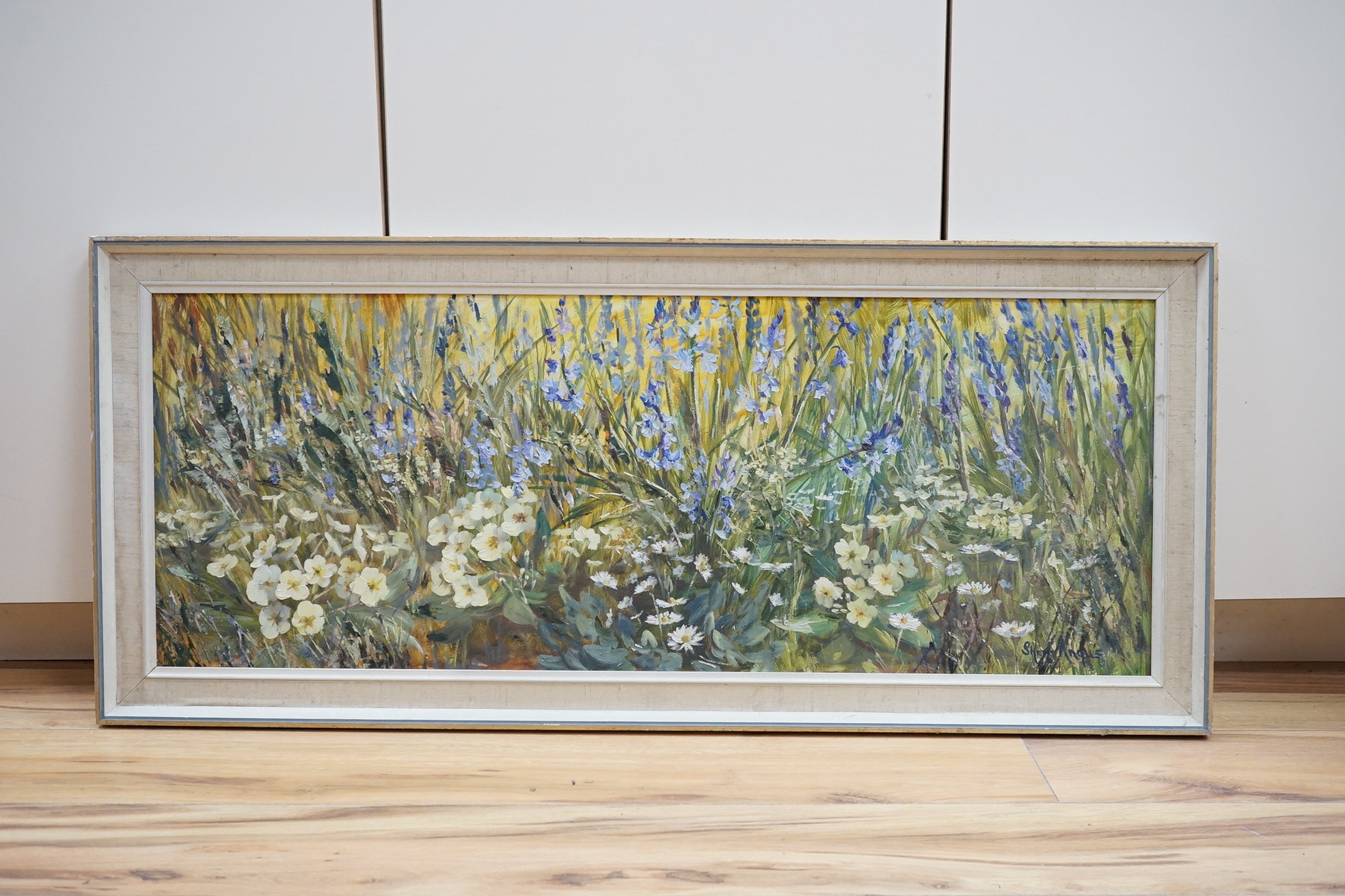 Sheila Angus (20th. C), oil on board, ‘May Flowers’, signed, 34 x 90cm. Condition - fair/good